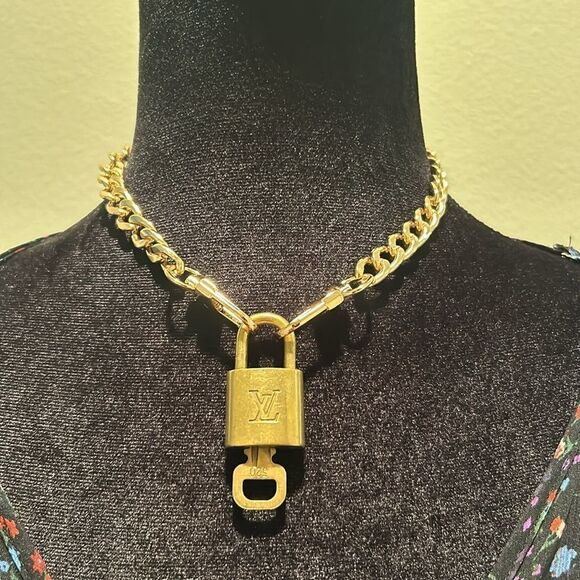 Louis Vuitton Other - Louis Vuitton #320 Lock and Key Brass Gold​